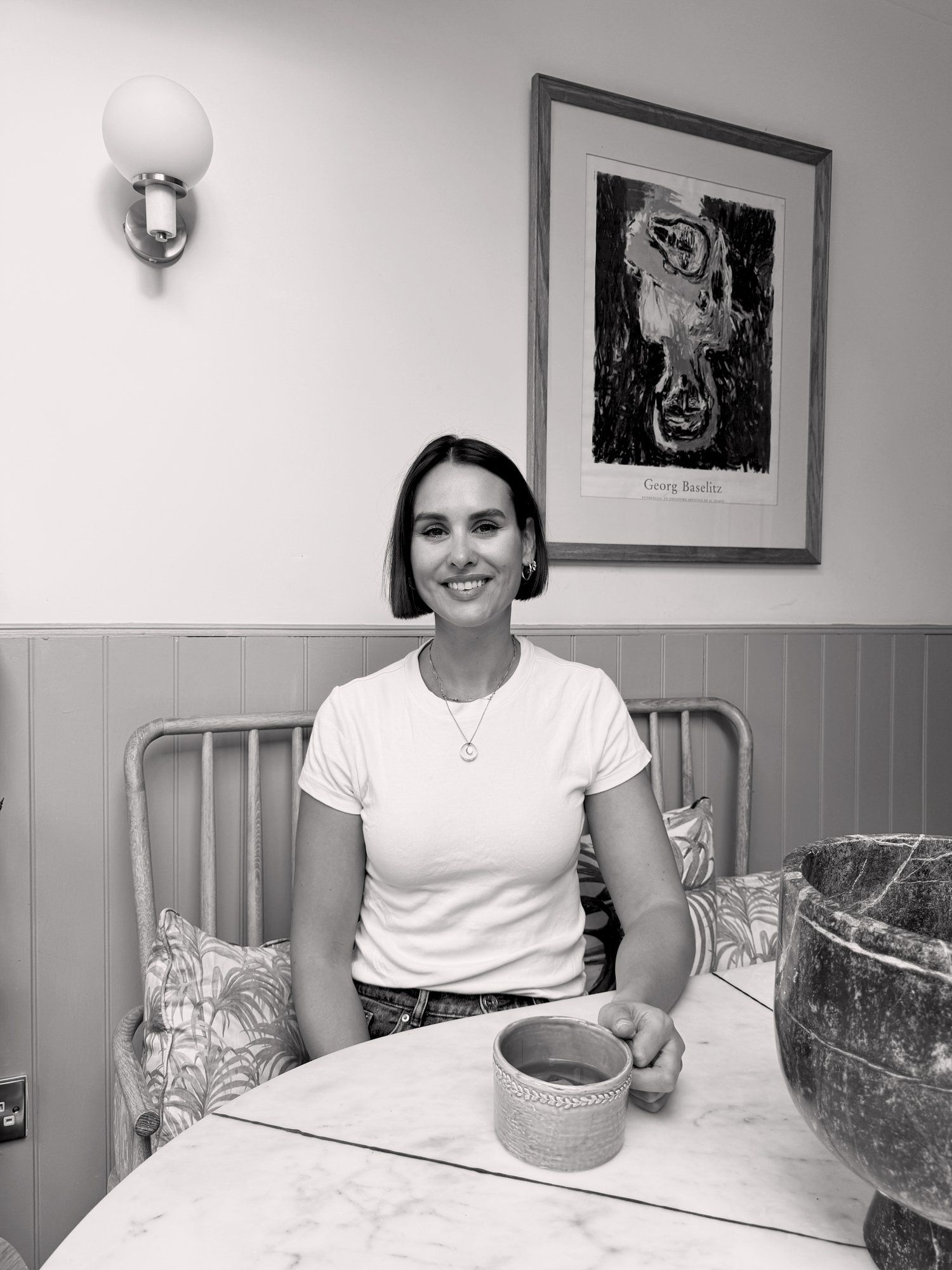 Camila Fernandez at a marble table at home